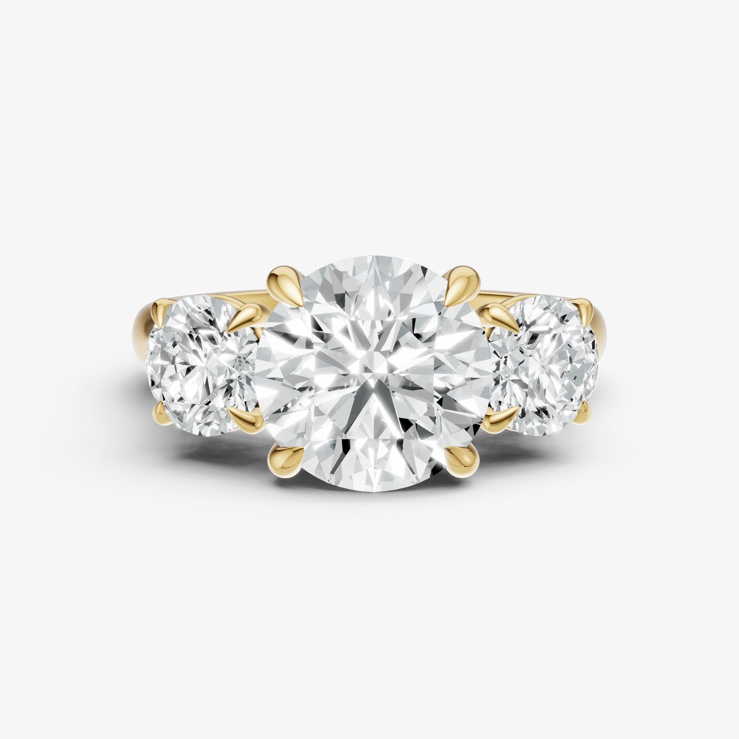 Round Trilogy Diamond Engagement Ring with 0.50ct Side Stones