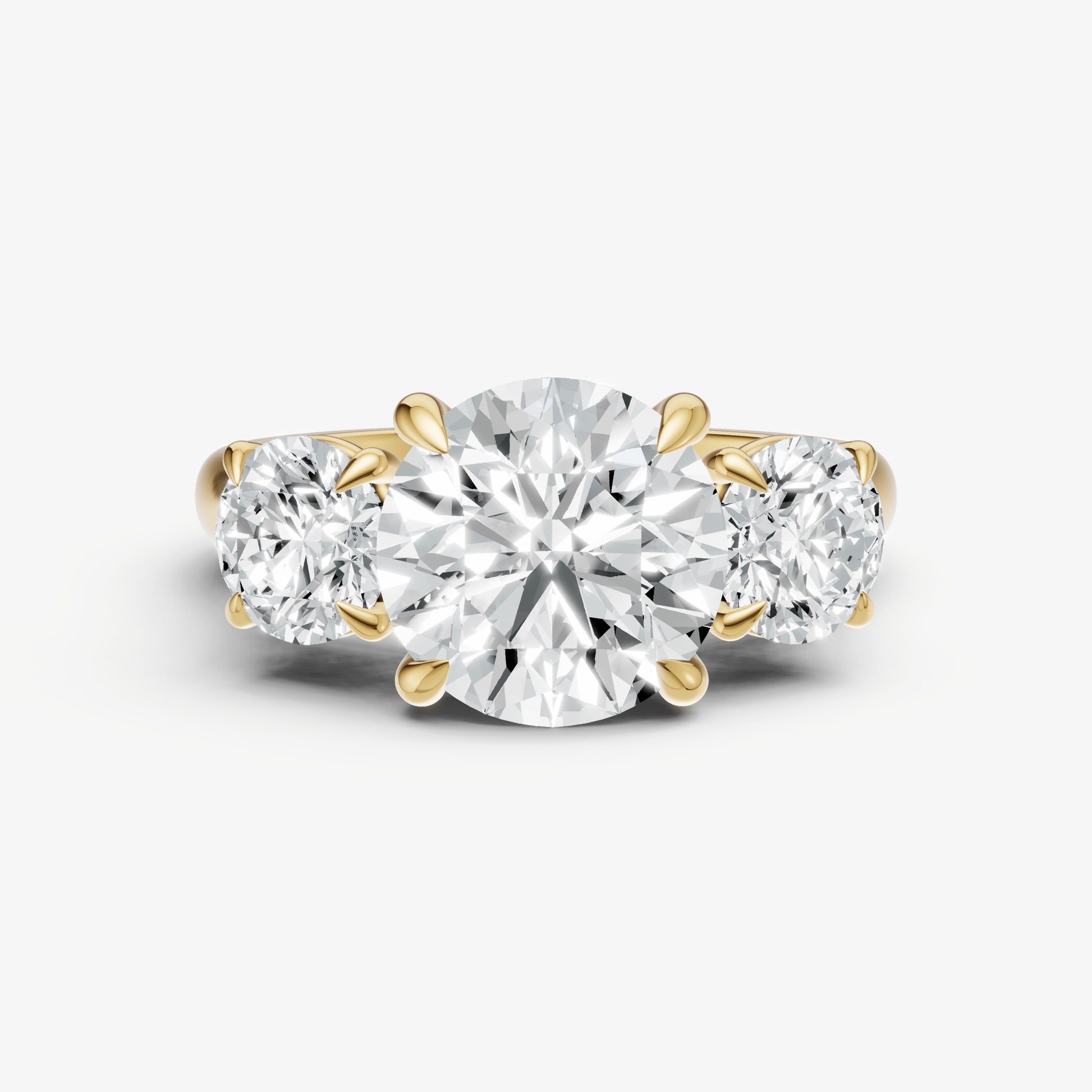 Round Trilogy Diamond Engagement Ring with 0.50ct Side Stones
