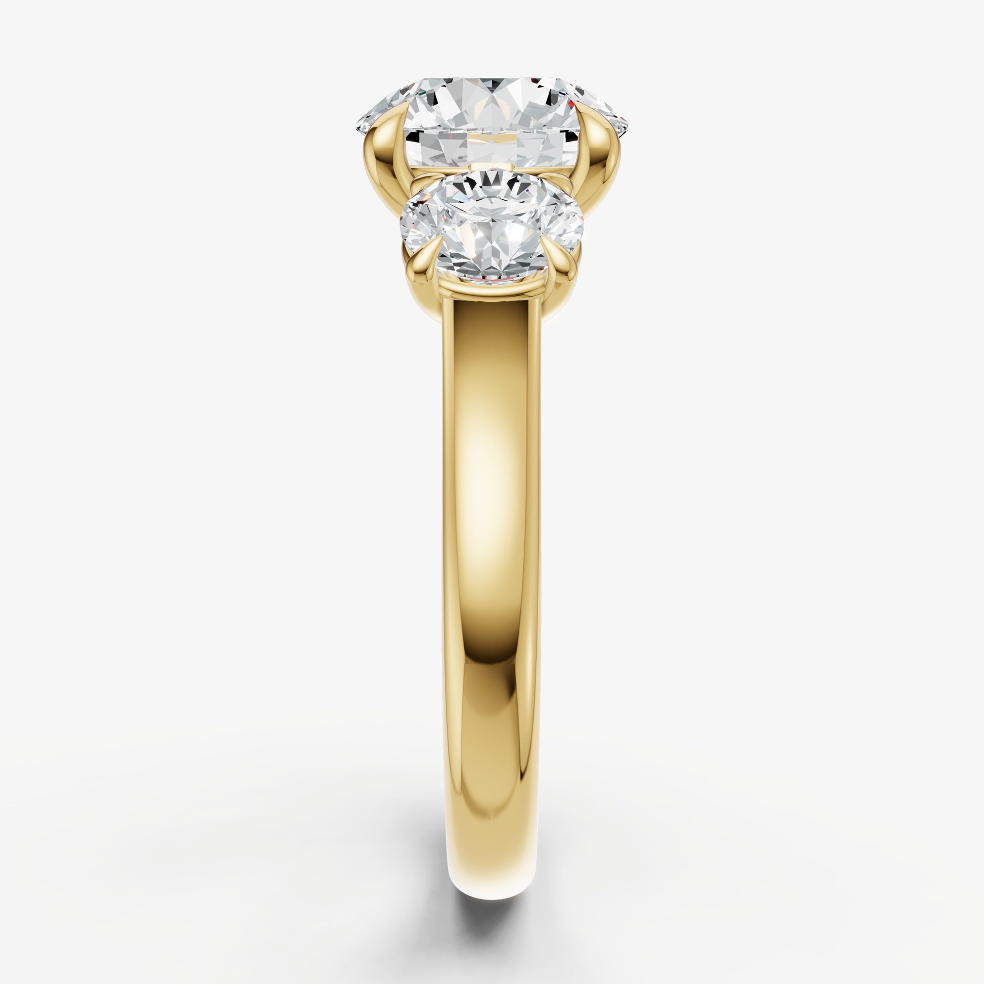Round Trilogy Diamond Engagement Ring with 0.50ct Side Stones
