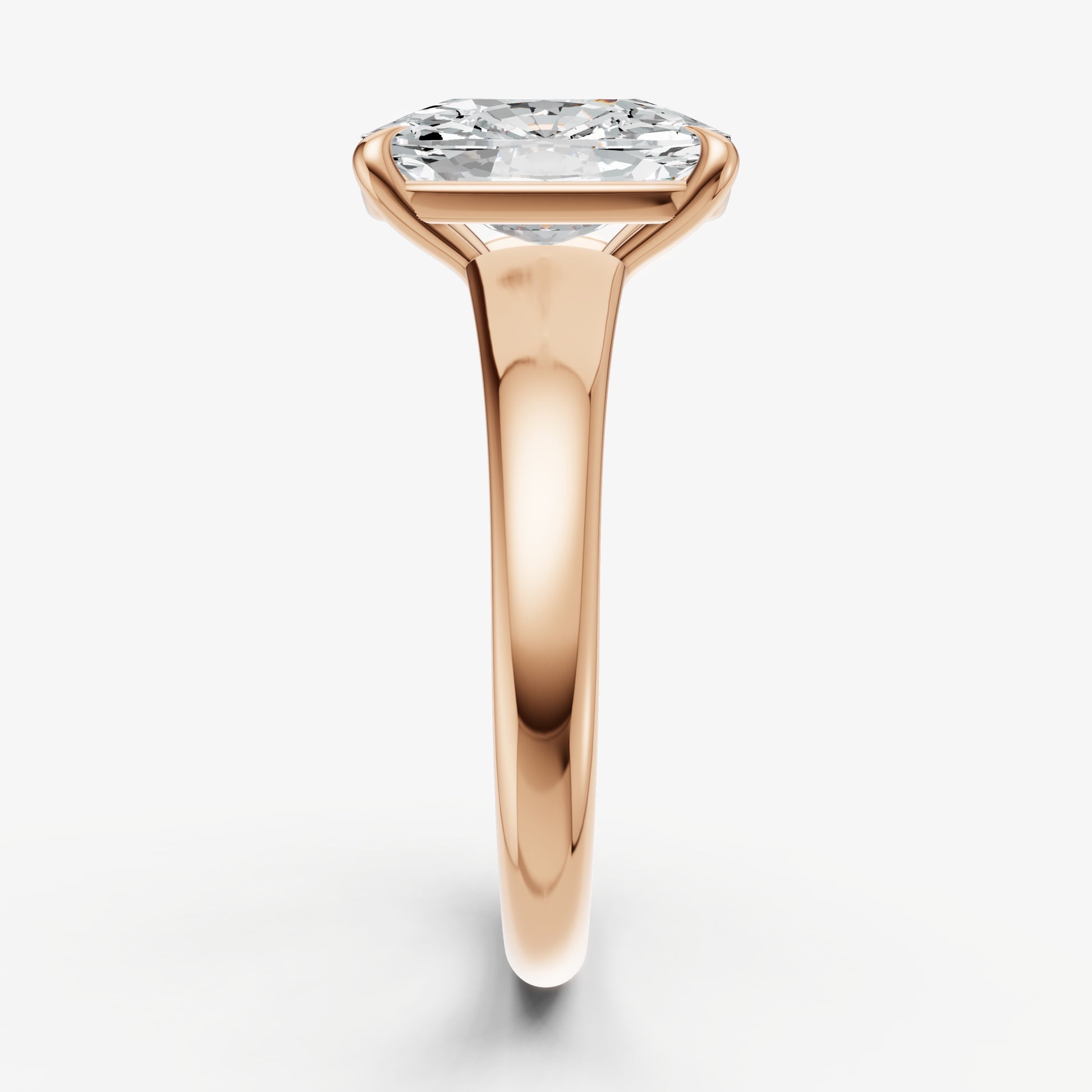 Elongated Cushion Solitaire Engagement Ring with Reverse Tapered Band