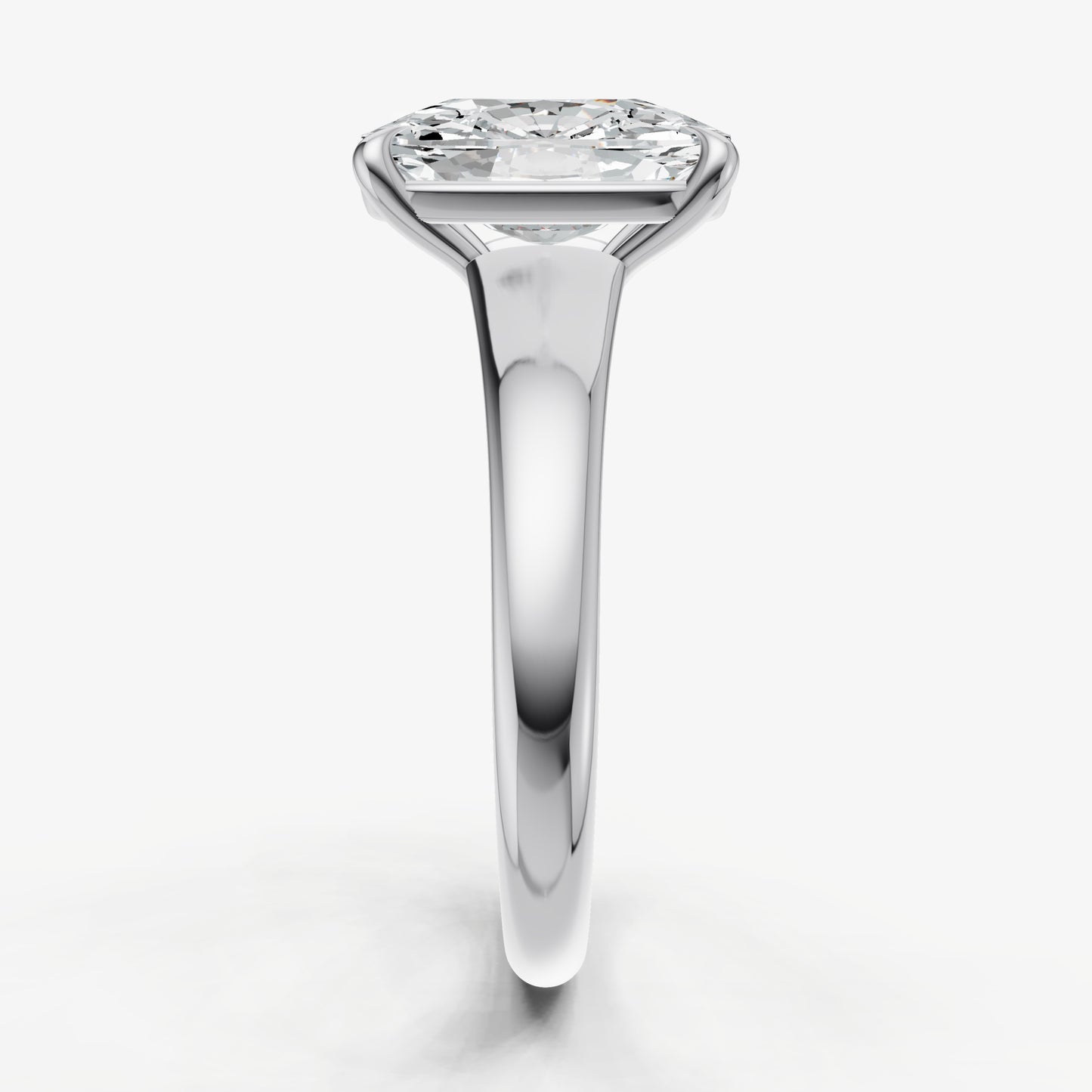 Elongated Cushion Solitaire Engagement Ring with Reverse Tapered Band
