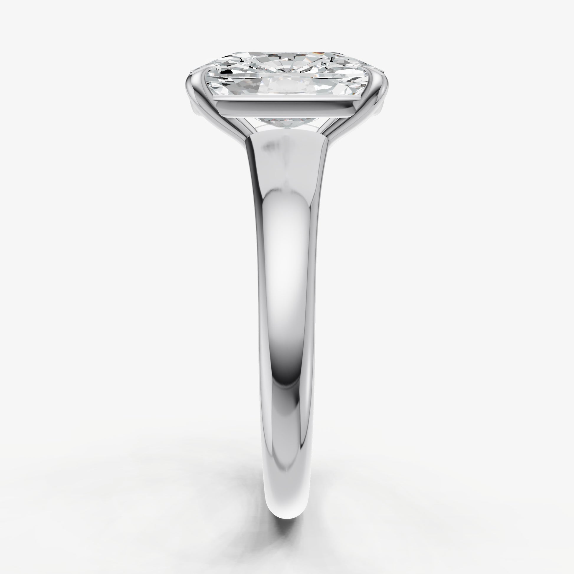 Elongated Cushion Solitaire Engagement Ring with Reverse Tapered Band