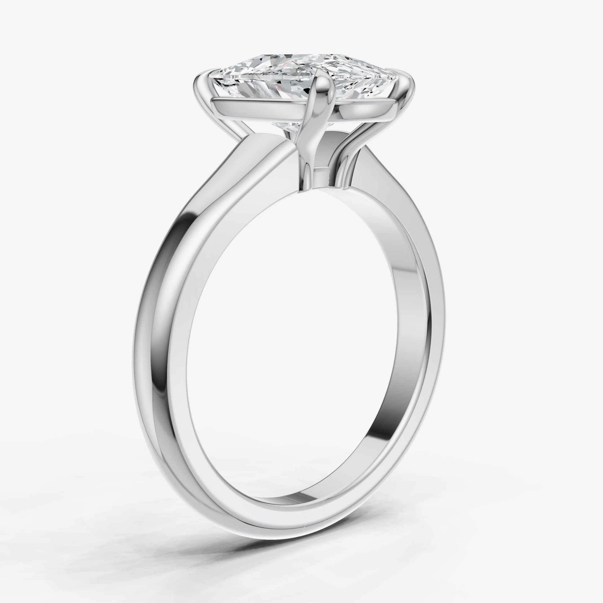 Elongated Cushion Solitaire Engagement Ring with Reverse Tapered Band
