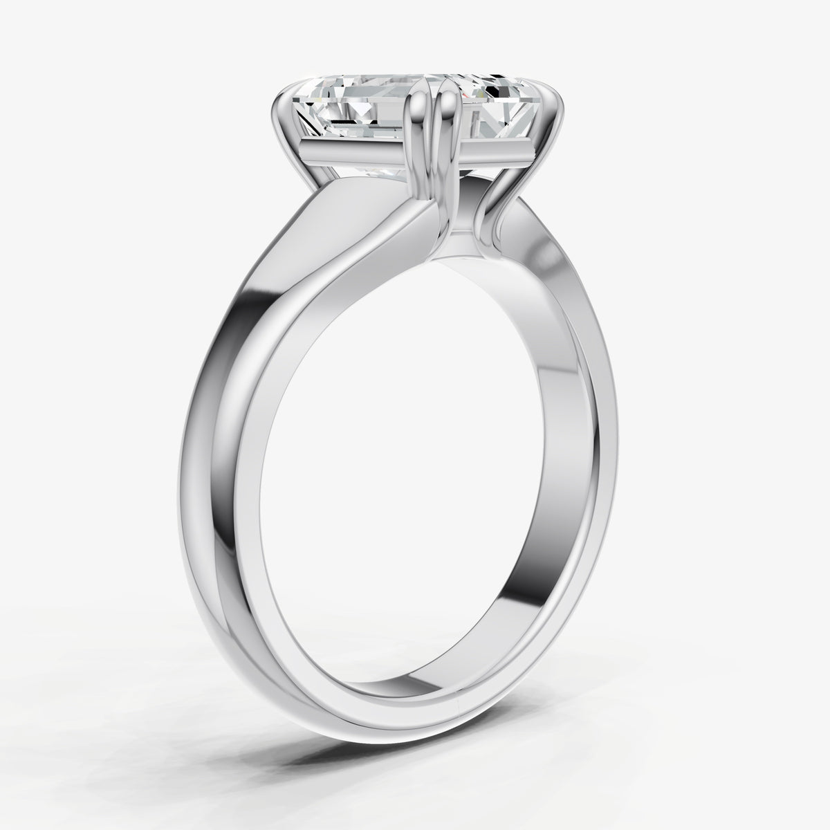 Large Taper Emerald Engagment Ring with Double Claws