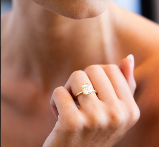 Bezel Set Engagement Ring with Emerald Cut Diamond