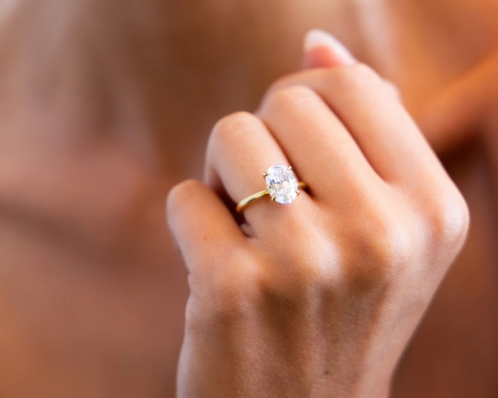 Hidden Halo Signature Solitaire Engagement Ring with Oval Cut Diamond