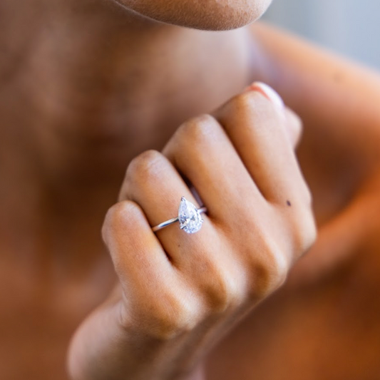 Knife Edge Solitaire Engagement Ring with Pear Cut Diamond