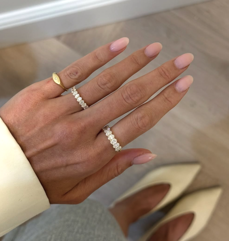 Shared Prong Band With Oval Cut Diamonds