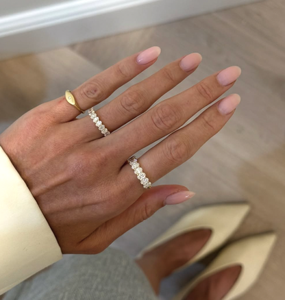 Shared Prong Band With Oval Cut Diamonds