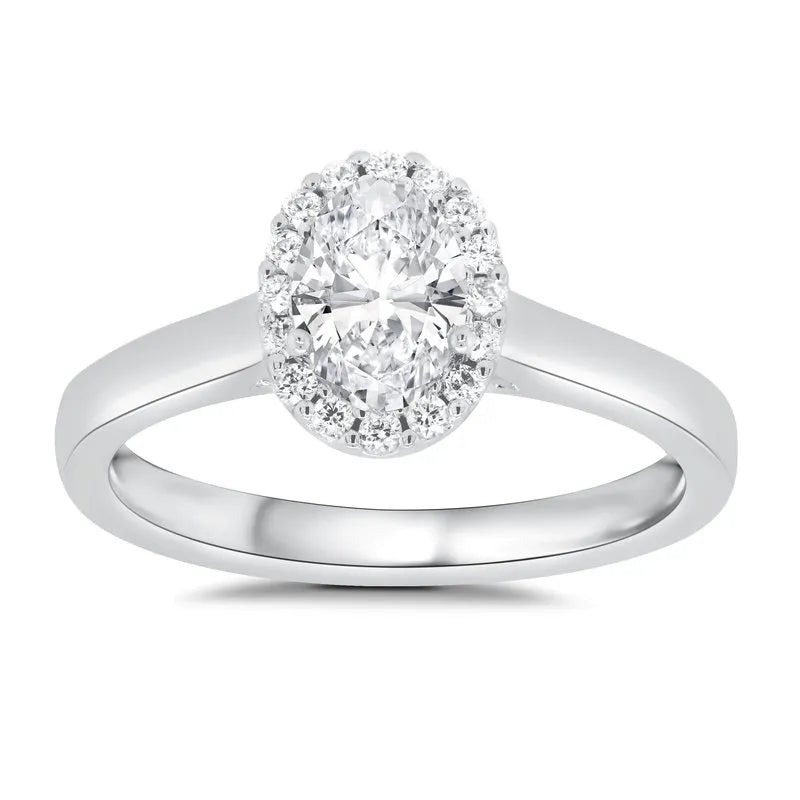 Halo engagement ring with clearance diamond band